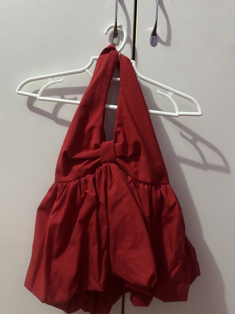 CORA BALLOON Halter Backless Top - Plain Red (Category: Sleeveless) located in Manila. Submitted by izzzzasclutter (Listing ID 1460255083, Image 1). Description: - Adorable red halter top - Trendy balloon hem design - Chic backless style - Made from comfortable poplin fabric - Fits bust sizes 30-36 inches - Versatile for night outs or casual days - Easily pairs with jeans or skirts NEVER WORN.