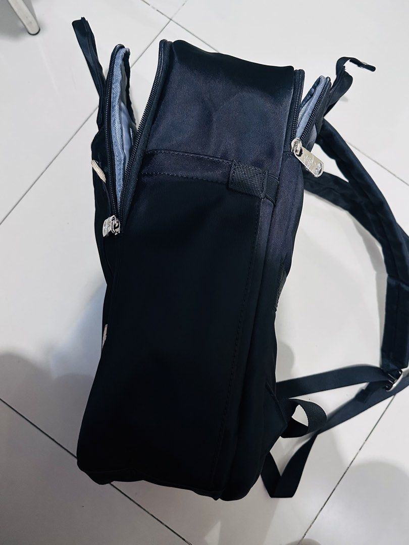 Cosé Black Backpack – Laptop Compartment & Multiple Pockets (Category: Backpacks) located in Quezon City. Submitted by yani_gleich (Listing ID 1460275948, Image 2). Description: Used it once for testing. Brand: Cosé Color: Black Type: Backpack / daypack /work bag Closure: Zipper Handles: 2 top carry handles Straps: Adjustable shoulder straps Pockets: Spacious main compartment, laptop compartment, large front zippered pocket, and side pockets Logo