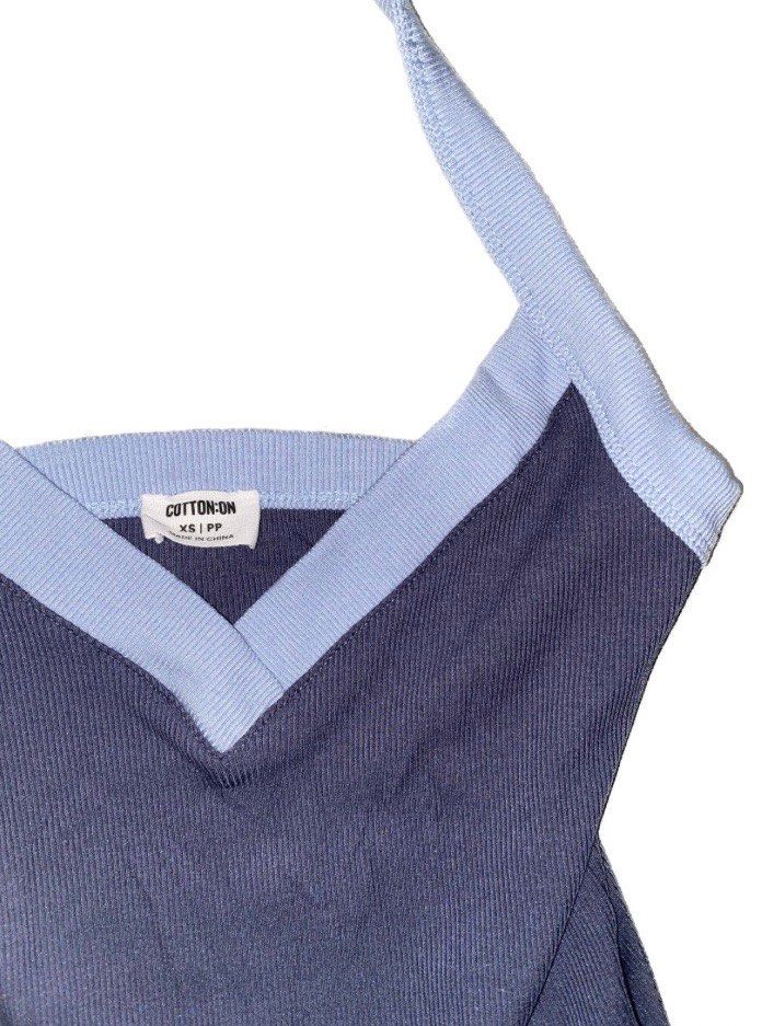 Cotton On ribbed halter top - blue & navy (Category: Sleeveless) located in Quezon City. Submitted by julesoutfitters (Listing ID 1460193432, Image 2). Description: - navy blue with light blue trim - ties around the neck - ideal for summer outfits - worn once only - payment through bank transfer - don’t hesitate to message me if u have any questions or want more pictures ! 🧑🏻‍🩰.
