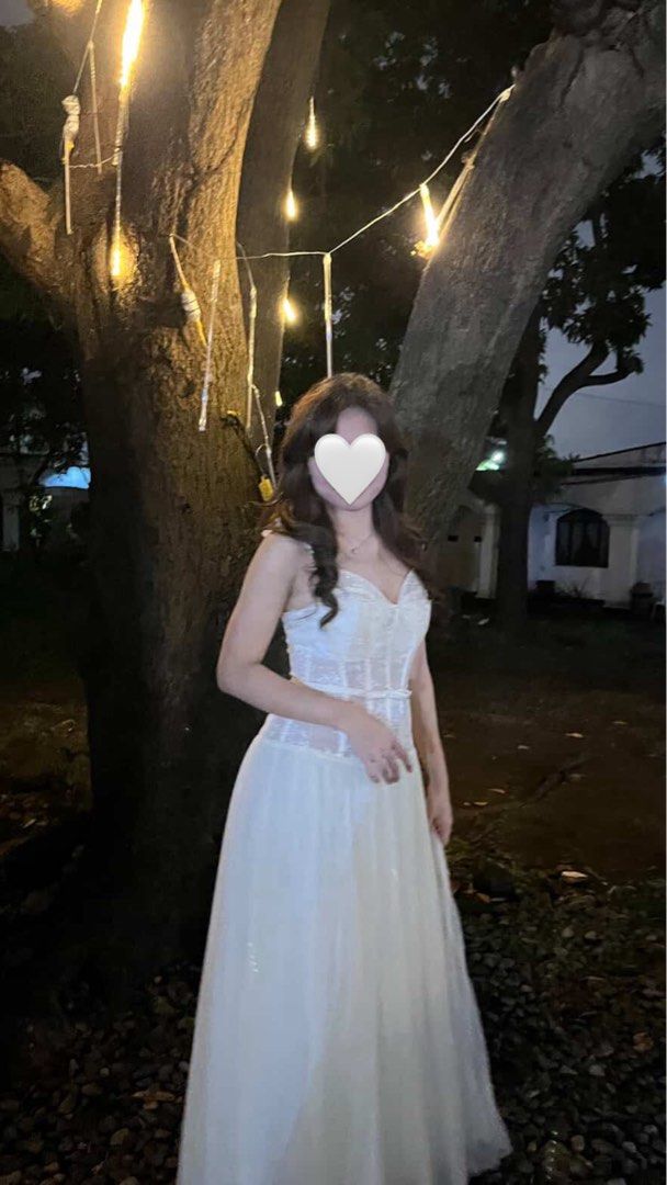 MMUSE FOR SALE OR FOR RENT (Category: Dresses) located in Quezon City. Submitted by msbuckwheat (Listing ID 1460226018, Image 3). Description: FOR RENT ALSO ₱800 - Elegant cream midi dress - Features a delicate lace corset top - Flowy pleated skirt - Worn only once for an event.