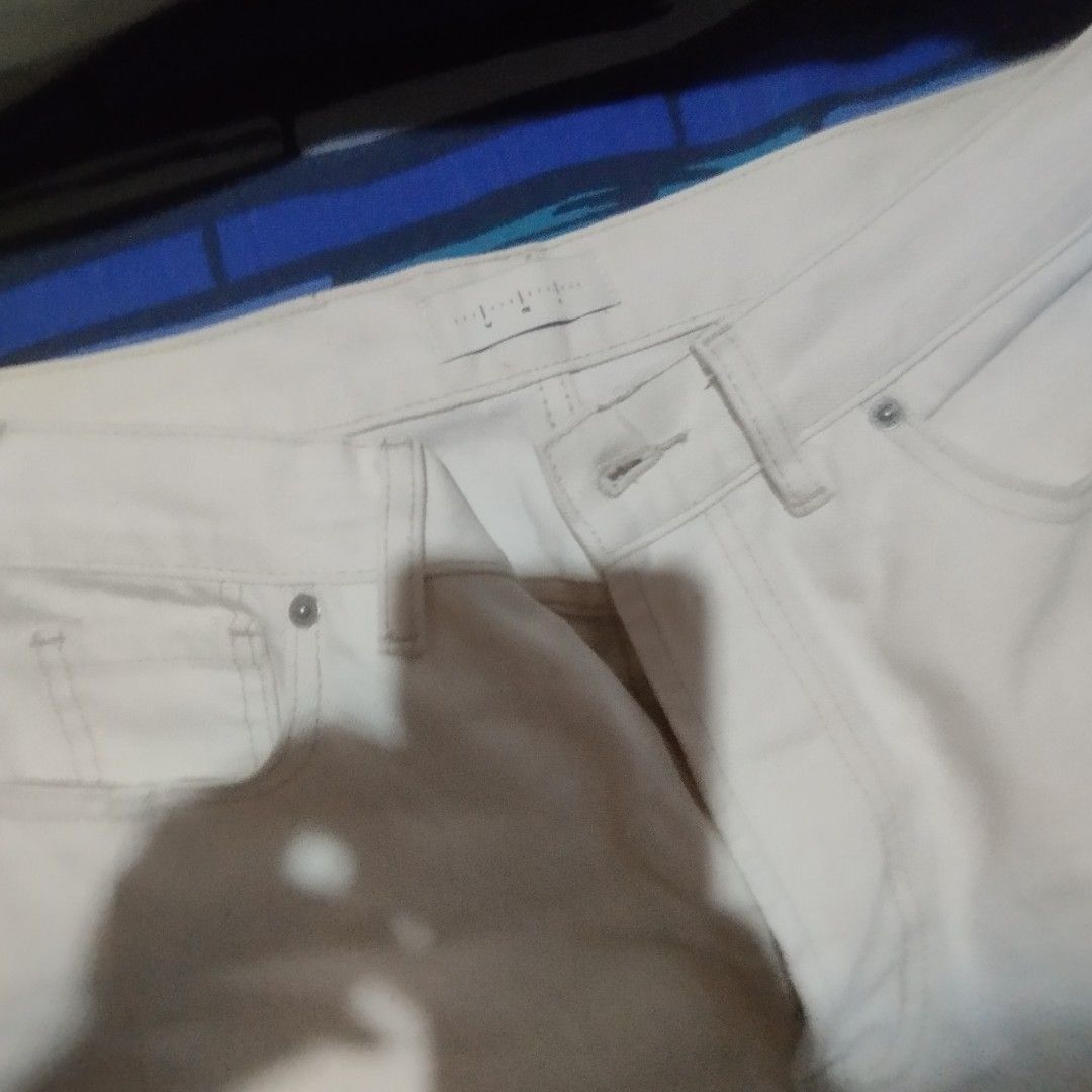 Cream Wide Leg Jeans (Category: Jeans) located in Manila. Submitted by lene48 (Listing ID 1460155129, Image 2). Description: - White wide leg jeans - High waisted fit - Button and zip closure - Front and back pockets - Cinched leg opening - Ideal for casual wear.