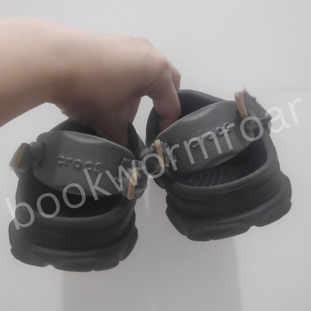 Crocs Classic All-Terrain Clogs (Black) (Category: Babies & Kids Fashion) located in Dasmarinas. Submitted by bookwormroar (Listing ID 1460298511, Image 3). Description: - Crocs Classic All-Terrain Clogs (Black) - Size: 17 CM | EU 28 | US 11 C | UK 10.5 | BR 27 - Pre-loved (GUC) - Box not included. - Free jibbitz - Adjustable strap at the back - Easy slip-on and off design - Comfortable for everyday wear.