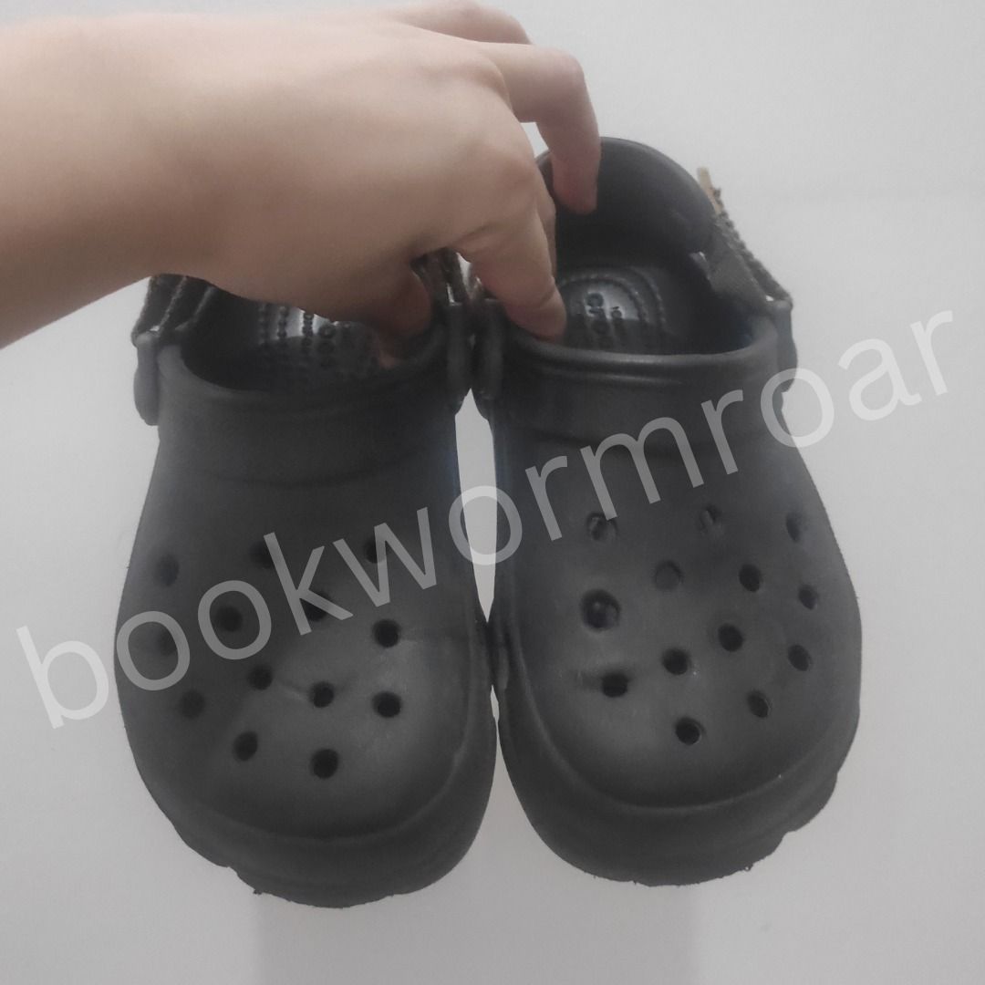 Crocs Classic All-Terrain Clogs (Black) (Category: Babies & Kids Fashion) located in Dasmarinas. Submitted by bookwormroar (Listing ID 1460298511, Image 2). Description: - Crocs Classic All-Terrain Clogs (Black) - Size: 17 CM | EU 28 | US 11 C | UK 10.5 | BR 27 - Pre-loved (GUC) - Box not included. - Free jibbitz - Adjustable strap at the back - Easy slip-on and off design - Comfortable for everyday wear.