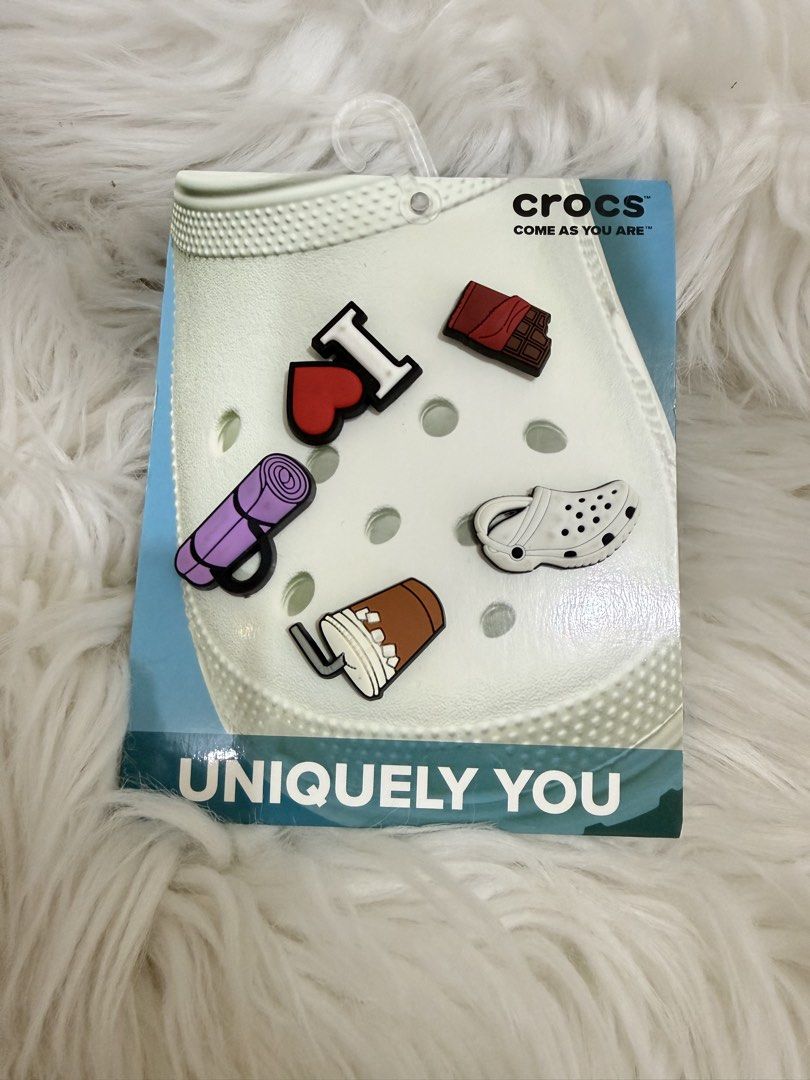 Crocs Jibbitz Charms - "I Love Crocs" Set (Category: Slippers and slides) located in Solano. Submitted by hayami. (Listing ID 1460138250, Image 1). Description: Set of 5 Jibbitz charms for Crocs. Includes "I ❤️ Crocs", chocolate bar, yoga mat, coffee cup, and mini Croc shoe. Personalize your Crocs easily..