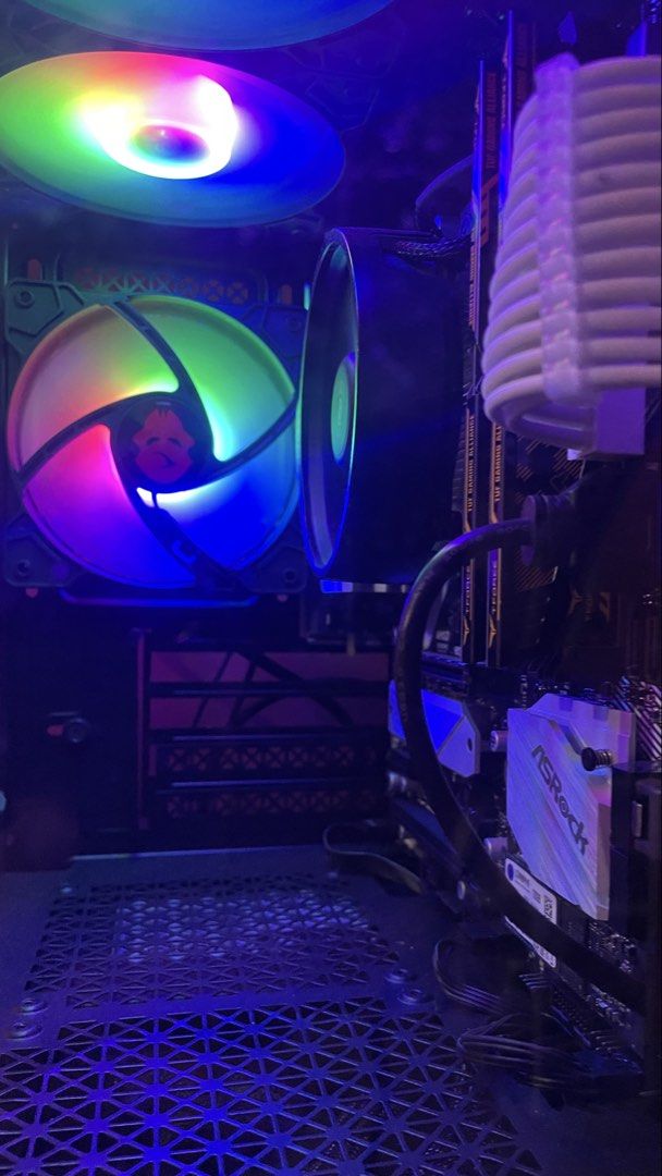Custom Gaming PC with RGB Lighting (Category: Desktops) located in Manila. Submitted by clarencesemaj (Listing ID 1460247180, Image 2). Description: CPU- AMD Ryzen 5 5600gt• motherboard Asrock- B550M Pro4 (NEW) RAM- T-Force VulcanZ 16gb 3600mhz (2x 8gb) PSU- Corsair VS550 550W 80+(NEW) CASE- Coolman Reyna FANS- 3x coolman RGB FANS SSD- 120gb M.2 SATA HDD- WD 500GB .