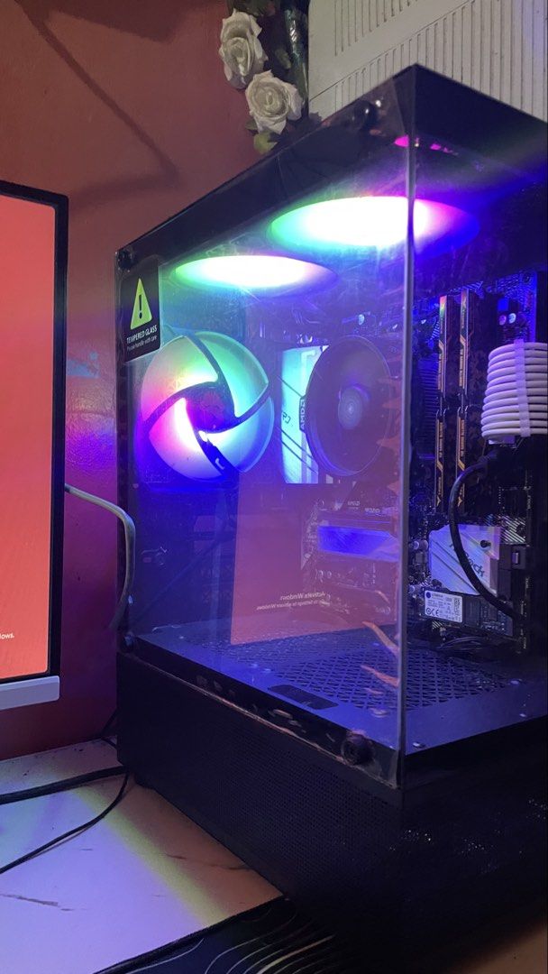 Custom Gaming PC with RGB Lighting (Category: Desktops) located in Manila. Submitted by clarencesemaj (Listing ID 1460247180, Image 3). Description: CPU- AMD Ryzen 5 5600gt• motherboard Asrock- B550M Pro4 (NEW) RAM- T-Force VulcanZ 16gb 3600mhz (2x 8gb) PSU- Corsair VS550 550W 80+(NEW) CASE- Coolman Reyna FANS- 3x coolman RGB FANS SSD- 120gb M.2 SATA HDD- WD 500GB .