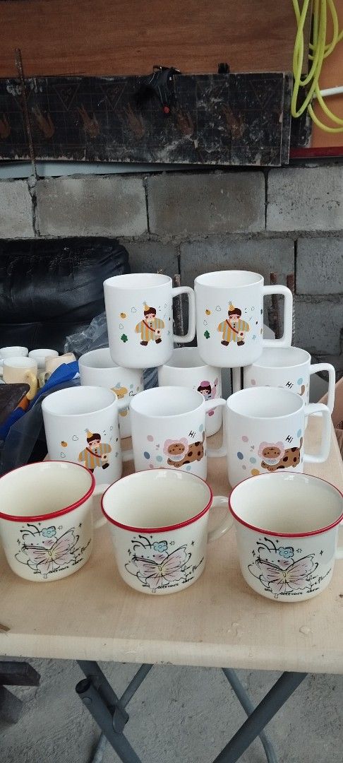 Cute Cartoon Mugs and Cups - Various Designs (Category: Coffee & Tea Tableware) located in Manila. Submitted by reilly.bee (Listing ID 1460209821, Image 1). Description: - Adorable mugs and cups with cute cartoon designs (bears, dogs, characters). - Features vibrant, colorful handles and rims on select designs. - Ideal for enjoying coffee, tea, or hot chocolate. - Makes a perfect gift or a delightful addition to your own collection. - Limited sto