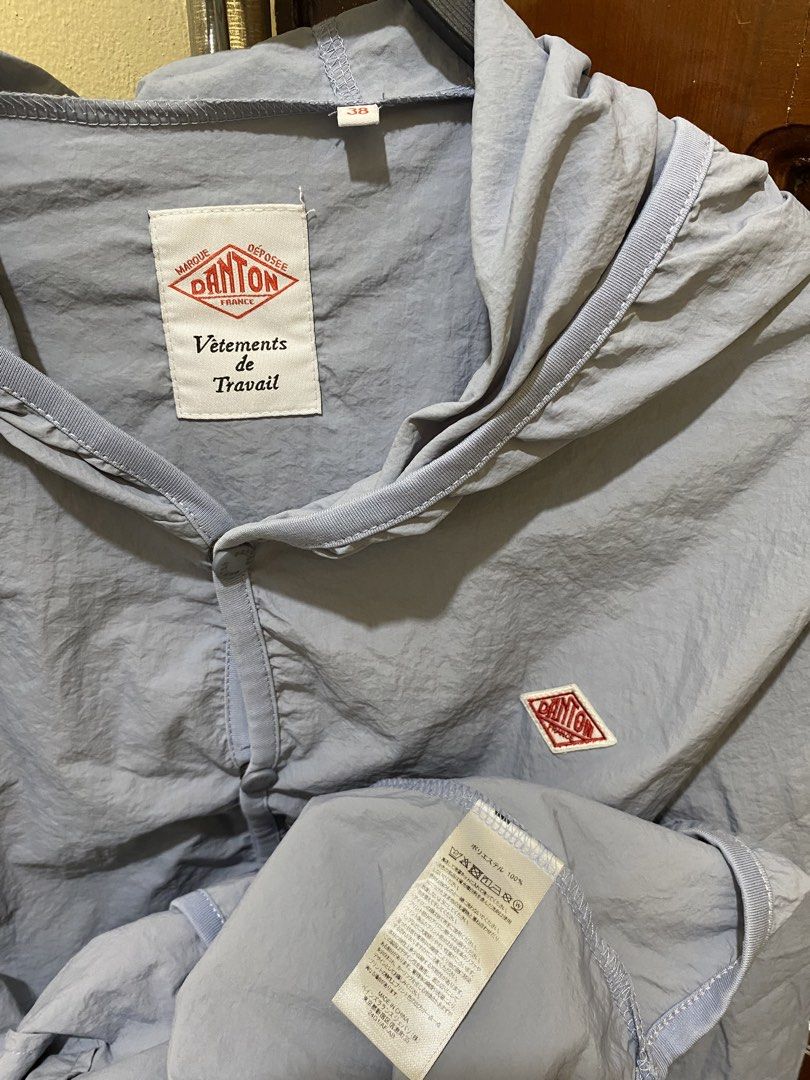 DANTON Lightweight Hooded Jacket Blue (Category: Coats, Jackets and Outerwear) located in Manila. Submitted by haveago0dthrift (Listing ID 1460142475, Image 3). Description: - Lightweight Danton jacket in a soft blue color. - Features a convenient hood and button-up front. - Made from a crinkled, very light material, ideal for layering or as a windbreaker. - Signature Danton logo embroidered on the chest. - Proudly made in France. - Size: 38 - Ha