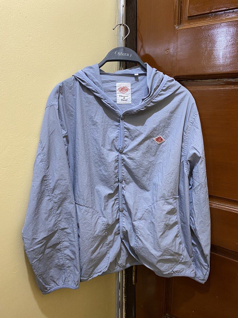 DANTON Lightweight Hooded Jacket Blue (Category: Coats, Jackets and Outerwear) located in Manila. Submitted by haveago0dthrift (Listing ID 1460142475, Image 1). Description: - Lightweight Danton jacket in a soft blue color. - Features a convenient hood and button-up front. - Made from a crinkled, very light material, ideal for layering or as a windbreaker. - Signature Danton logo embroidered on the chest. - Proudly made in France. - Size: 38 - Ha