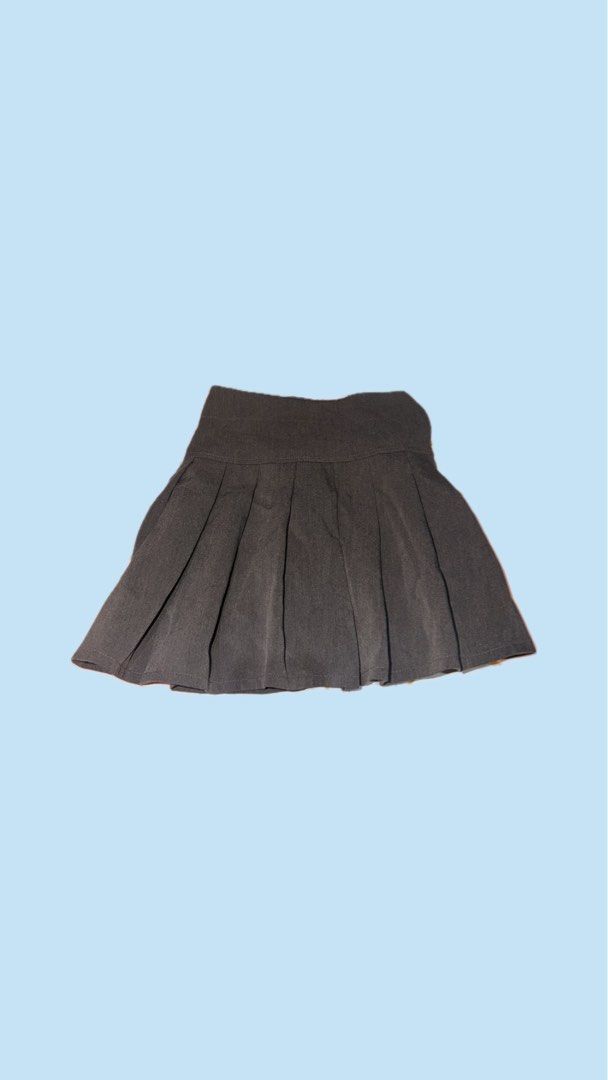Dark Grey Pleated Mini Skirt (Category: Skirts) located in Manila. Submitted by cheyaarchives (Listing ID 1460196500, Image 1). Description: - Cute dark grey pleated mini skirt - High-waisted style - Ideal for school or casual wear - Easy to pair with various tops - Looks great with sneakers or boots.