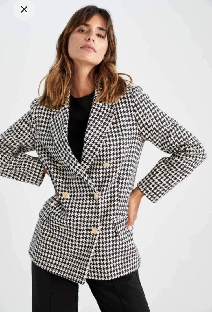 De Facto Houndstooth Double-Breasted Blazer (Category: Coats, Jackets and Outerwear) located in Manila. Submitted by litphilofashion (Listing ID 1460275462, Image 1). Description: - Classic houndstooth pattern blazer - Double-breasted style - Features elegant gold buttons - Sharp and chic design - Perfect for dressing up or down - Ideal for work or a night out - Easily pairs with trousers or jeans.