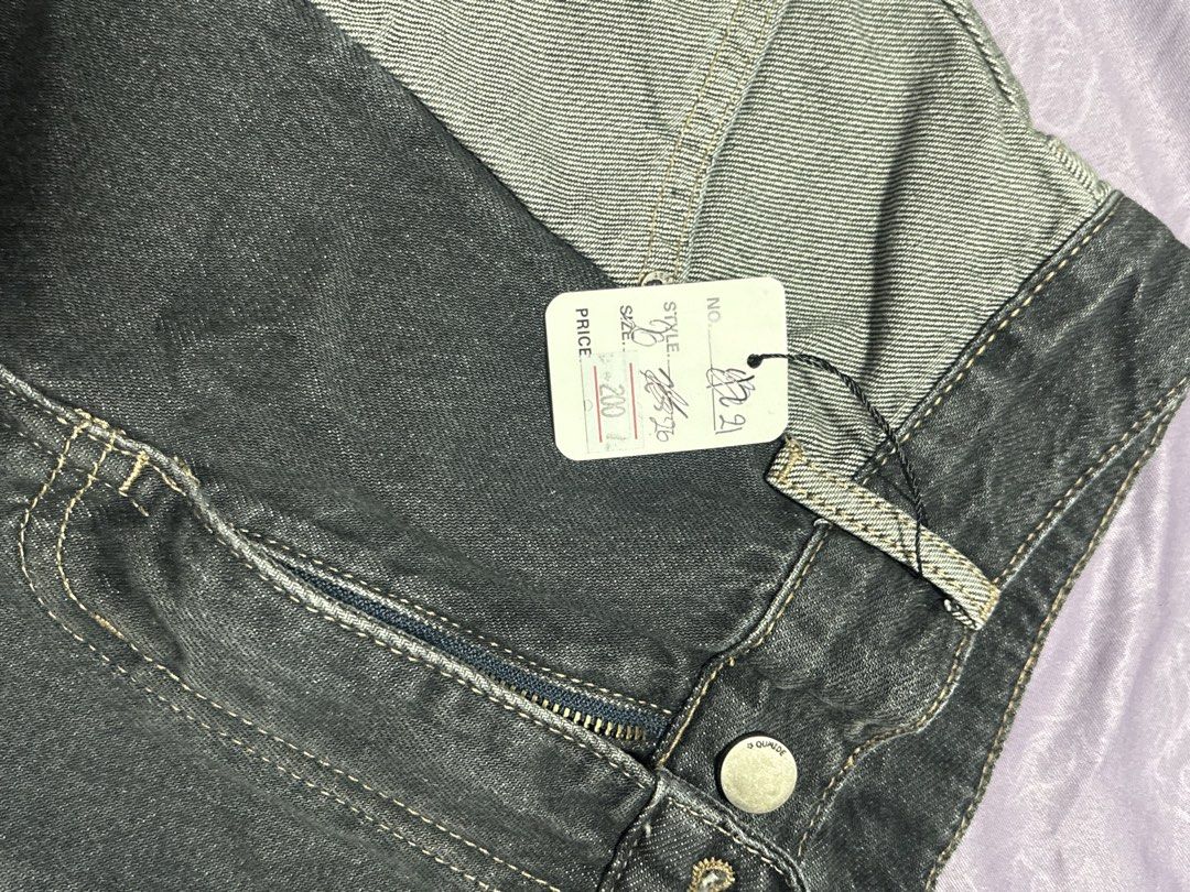 Denim Colorblock Shorts (Category: Shorts) located in Pasay City. Submitted by nicoletlntn_ (Listing ID 1460235086, Image 2). Description: - Stylish colorblock denim shorts in dark and light grey. - Zipper fly with button closure for a secure fit. - Features two convenient back pockets. - Estimated size: 26. - Brand new with original tag still attached. - Original purchase price: ₱200..