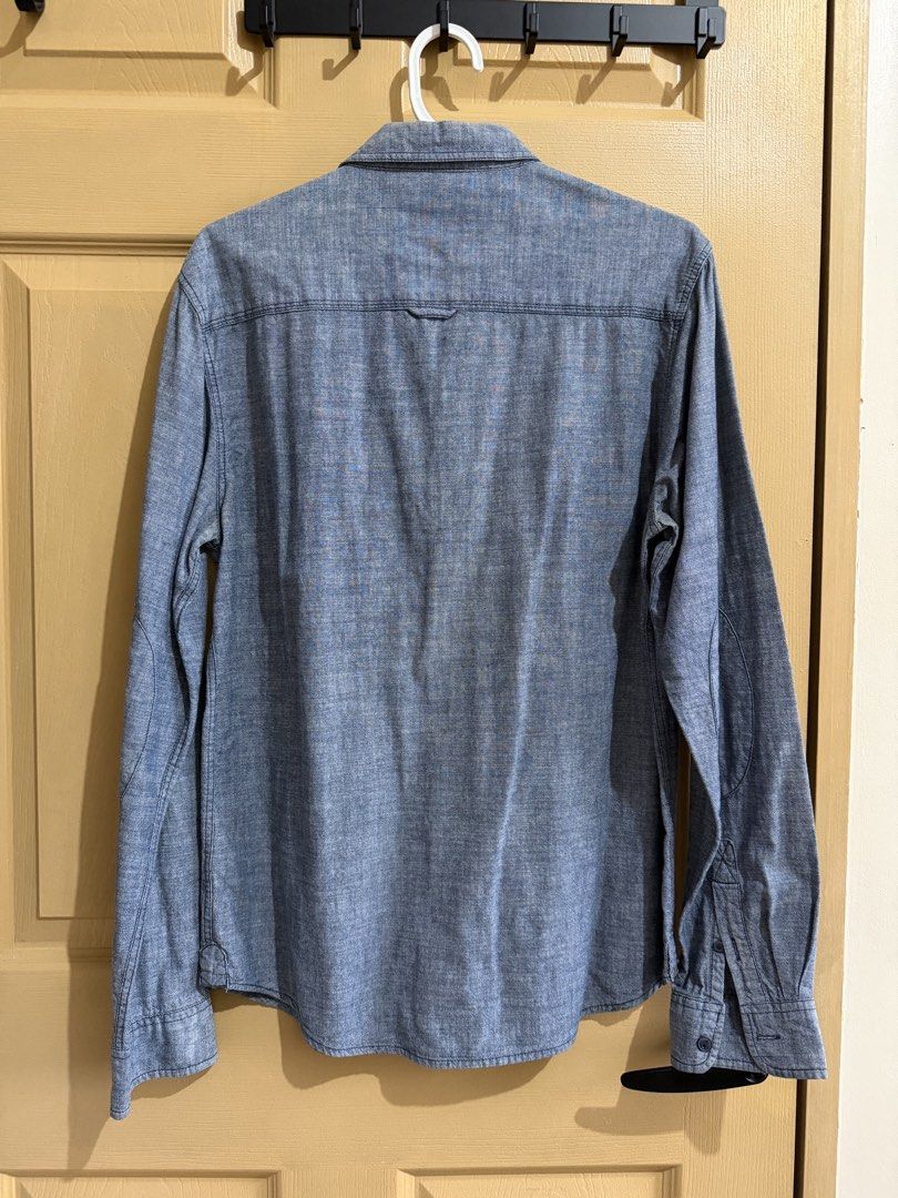 Denim Long Sleeves (Category: Formal Shirts) located in Manila. Submitted by chavirly (Listing ID 1460193914, Image 2). Description: Denim long sleeves top versatile for casual or formal events. .