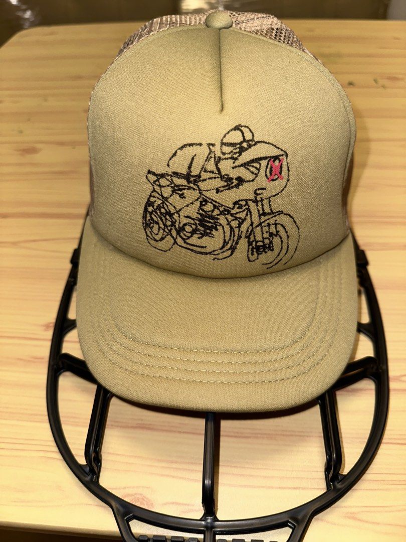 Deus ex Machina Khaki Trucker Cap (Category: Caps & Hats) located in Quezon City. Submitted by mancave_stuff (Listing ID 1460105717, Image 1). Description: - Deus ex Machina Khaki trucker cap with vintage cafe racer motorcycle - Breathable mesh back for comfort - Adjustable strap for a customized fit - Ideal for everyday casual wear - Made in China (60% Polyester, 40% Nylon).