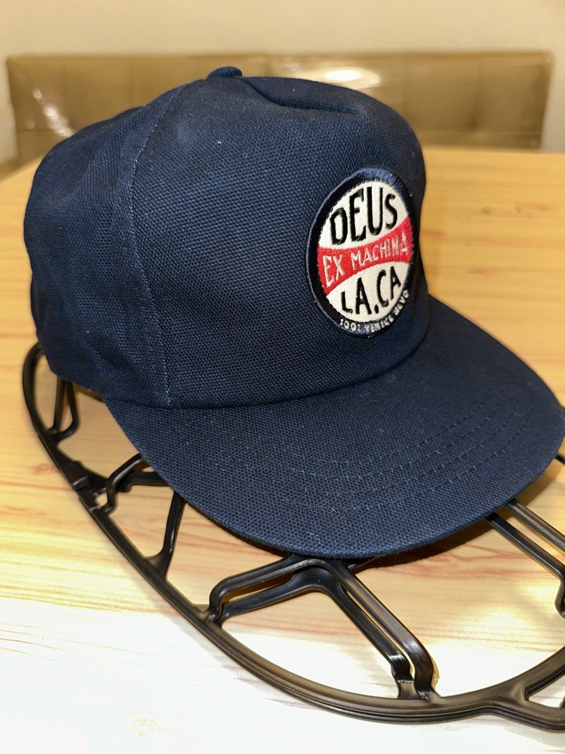 Deus ex Machina L.A. California cap (Category: Caps & Hats) located in Quezon City. Submitted by mancave_stuff (Listing ID 1460107122, Image 3). Description: -Deus ex Machina Navy blue L.A.C.A. Venice blvd logo -Surf, Moto, Vintage Automobilia wear -with Forehead breathable mesh .