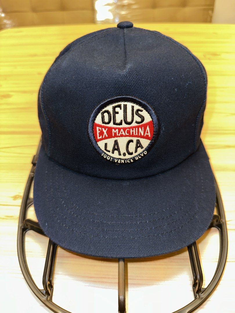 Deus ex Machina L.A. California cap (Category: Caps & Hats) located in Quezon City. Submitted by mancave_stuff (Listing ID 1460107122, Image 1). Description: -Deus ex Machina Navy blue L.A.C.A. Venice blvd logo -Surf, Moto, Vintage Automobilia wear -with Forehead breathable mesh .
