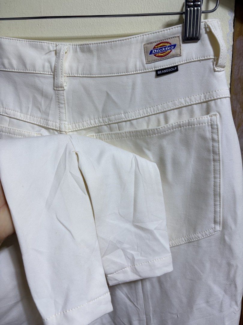 Dickies x BEAMSGOLF Cream Split Hem Pants (Category: Jeans) located in Paete. Submitted by skydruemadison (Listing ID 1460286215, Image 3). Description: - Cream colored pants - Collaboration: Dickies x BEAMSGOLF - Fit: Straight leg - Detail: Split hem at bottom - Pockets: Classic five-pocket styling - Closure: Button and zip fly - Versatile: Great for casual wear or a sporty look.