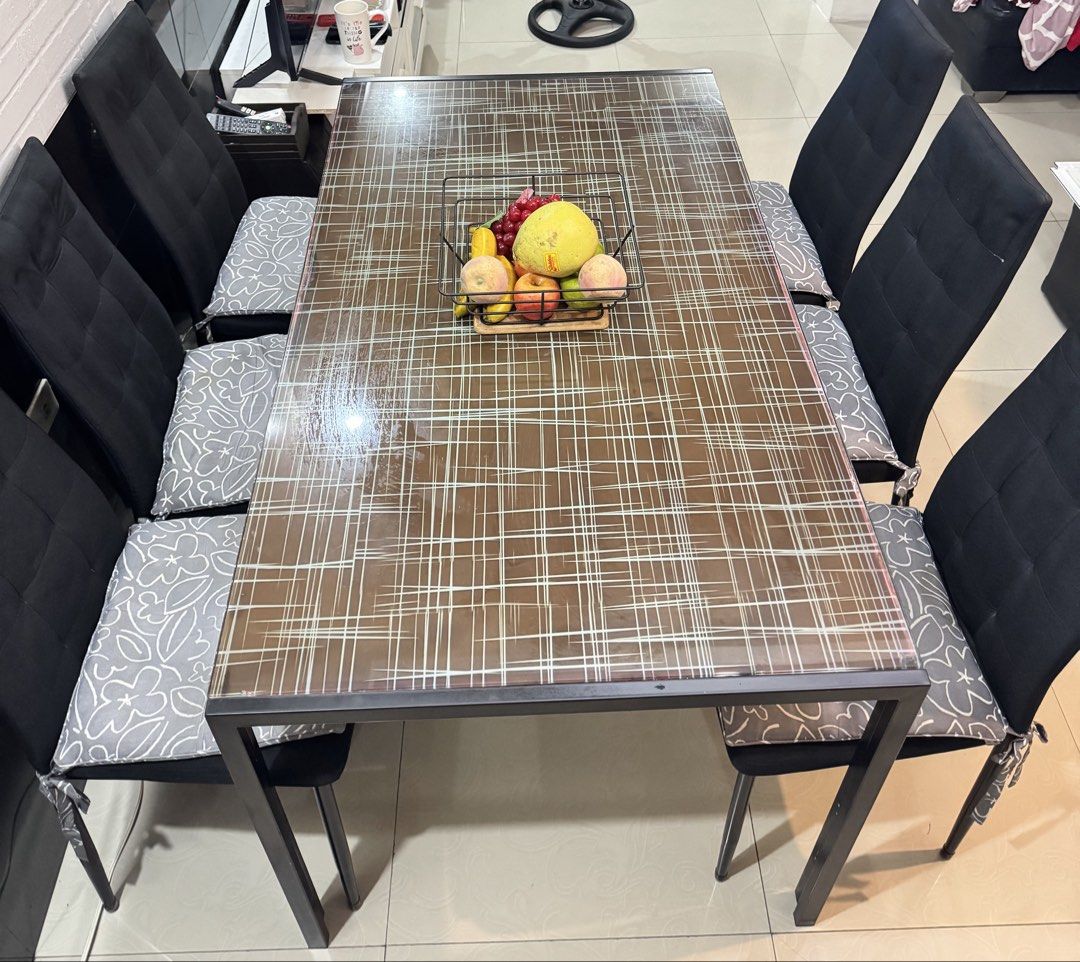 DINING TABLE | 6 SEATER (Category: Tables & Sets) located in Pasig City. Submitted by grabwearmnl (Listing ID 1460230598, Image 2). Description: - Dining Table (6 Seater) - Original price: ₱18,700.00 - Selling price: ₱10,000 - with Glass on Top - All the chairs have been newly welded - 6 chair foam included - Table Size: Length: 140cm | Width: 79.5cm | Height: 74.5cm 🚚: Lalamove for same day delivery 📍: Pick up: (Santolan, Pasig City) RFS: will