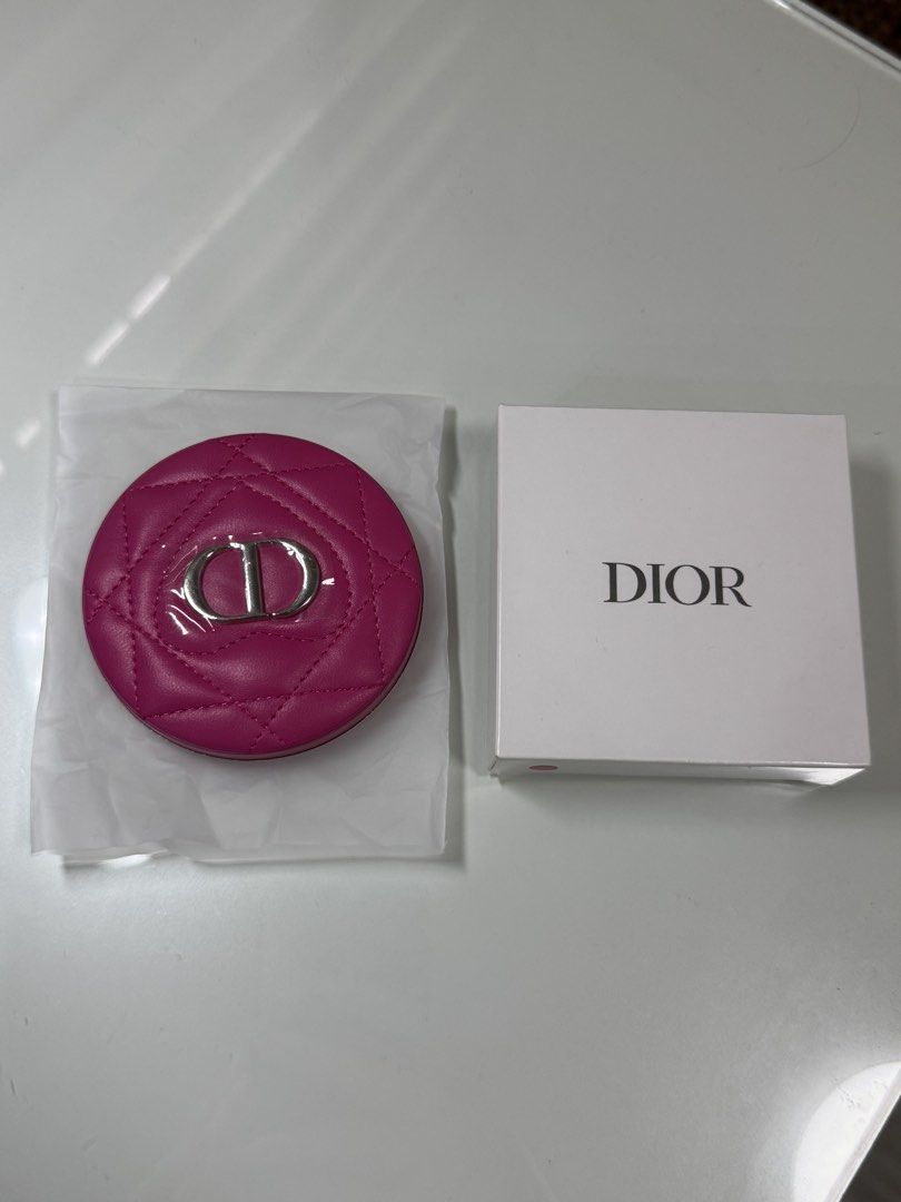 Dior Hot Pink Quilted Logo Pocket Mirror (Category: Mirrors) located in Manila. Submitted by decluterrrr (Listing ID 1460127251, Image 2). Description: - Authentic Christian Dior pocket mirror - Features a bright pink quilted design with iconic CD logo - Opens to reveal two mirrors - Promotional item from Dior perfumes - Comes with original box and packaging.