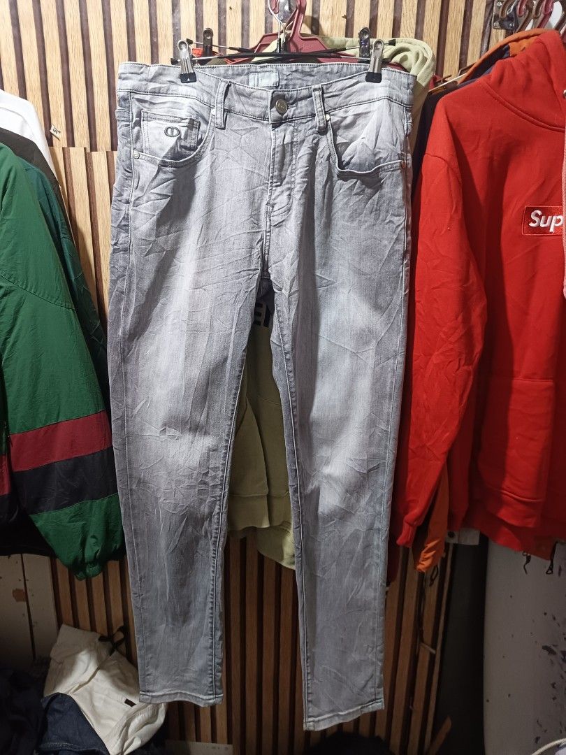 Dior Jeans Acid Wash (Category: Luxury Apparel) located in Cebu City. Submitted by iamnegotiable (Listing ID 1460222534, Image 1). Description: Dior Jeans Dior Men's gray wash jeans Slim fit jeans ykk complete tags Dimes measured on flat surface Waistline 32-33 Length 40 Leg opening 6-6.5 inch issue may white spot bleach available price negotiable.