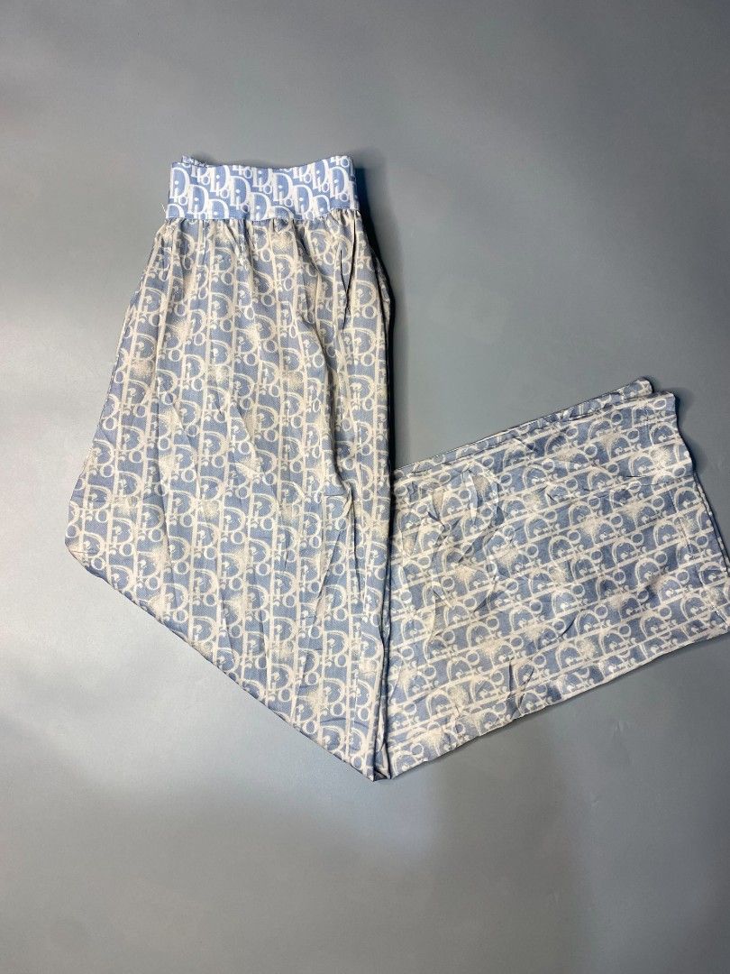 Dior Monogram Pants (Category: Jeans) located in Ajuy. Submitted by quickcrystal-effaca (Listing ID 1460300703, Image 2). Description: - Dior monogram pants - Color: Light blue and white - Features an elastic waistband for comfort - Relaxed fit, designed for ultimate comfort - Ideal for lounging or casual wear.