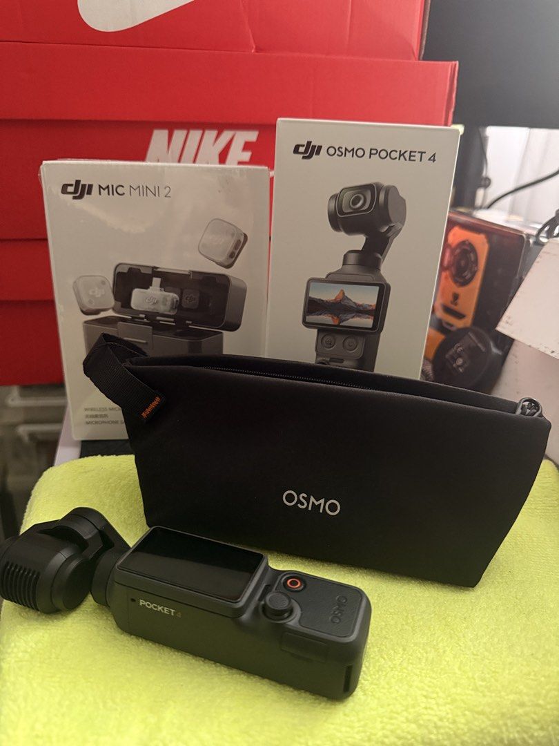 DJI Osmo Pocket 4 Gimbal with Mic Mini 2 (Category: Video Cameras) located in Manila. Submitted by emenel (Listing ID 1460124798, Image 2). Description: - DJI Osmo Pocket 4 gimbal stabilizer - DJI Mic Mini 2 wireless microphone system - Includes original boxes - Comes with a black OSMO carrying pouch - Ideal for vlogging and content creation Bundle po. Mic mini 2 and pocket 4. Good as new, can also provide receipt for warranty. Purchased from dji