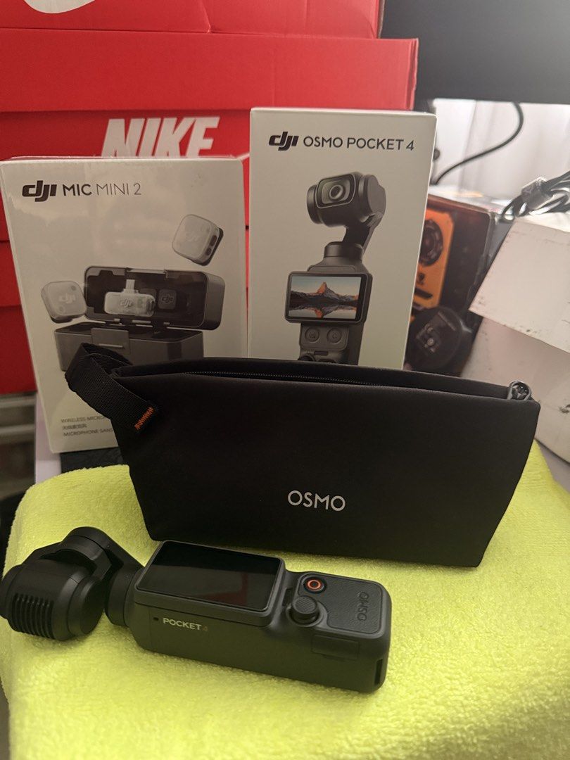 DJI Osmo Pocket 4 Gimbal with Mic Mini 2 (Category: Video Cameras) located in Manila. Submitted by emenel (Listing ID 1460124798, Image 3). Description: - DJI Osmo Pocket 4 gimbal stabilizer - DJI Mic Mini 2 wireless microphone system - Includes original boxes - Comes with a black OSMO carrying pouch - Ideal for vlogging and content creation Bundle po. Mic mini 2 and pocket 4. Good as new, can also provide receipt for warranty. Purchased from dji