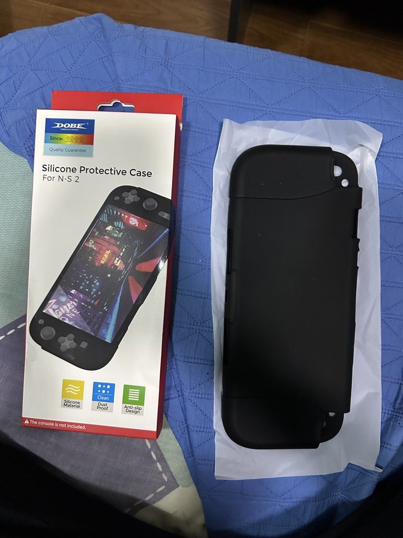 DOBE Silicone Protective Case for Nintendo Switch Lite (N-S 2) (Category: Nintendo) located in Quezon City. Submitted by tobygabriel.696 (Listing ID 1460216598, Image 2). Description: - Black silicone protective case for Nintendo Switch 2 - Made from durable silicone material - Features dustproof and anti-slip design - Offers protection against scratches and accidental drops - Please note: Console is not included.