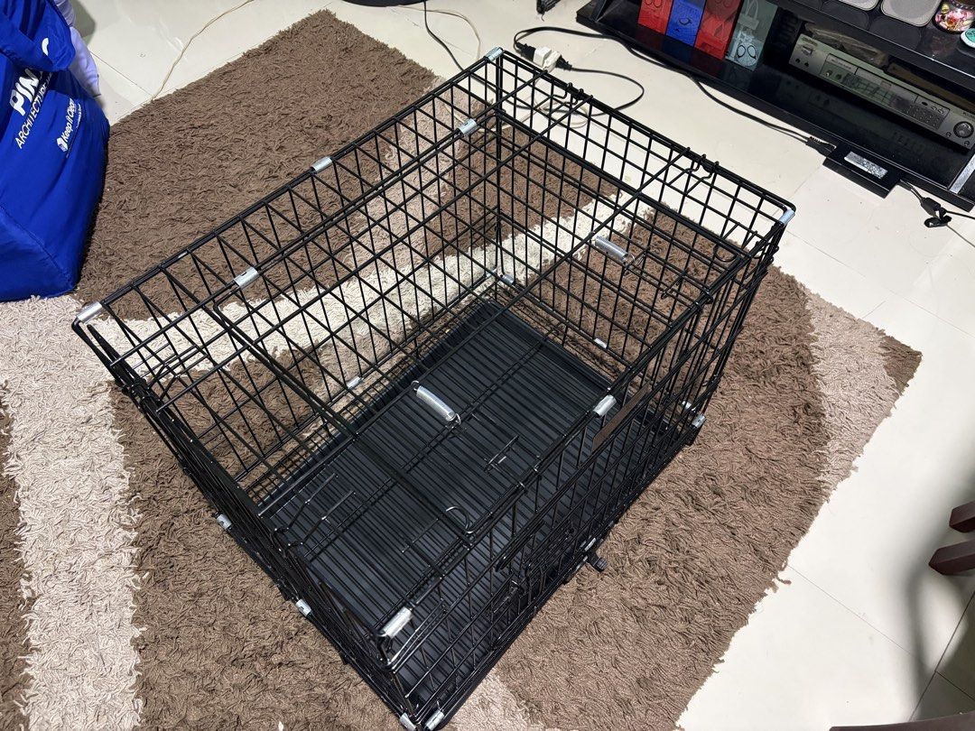 Dog Cage with Tray (Category: Homes & Other Pet Accessories) located in Manila. Submitted by bubblewaps (Listing ID 1460190834, Image 2). Description: - foldable - good as new - ONLY USED ONCE - 600mmx430mm - MOP: gcash - MOD: Lalamove -LOC: Marikina.
