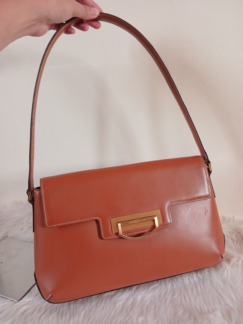 Double M Milano (Category: Shoulder Bags) located in Cagayan de Oro. Submitted by f.closet. (Listing ID 1460124804, Image 1). Description: Good condition with minor scratches sa back part over all good condition , no damage manage yoir expectations ,item is thrift super hidgh quality .