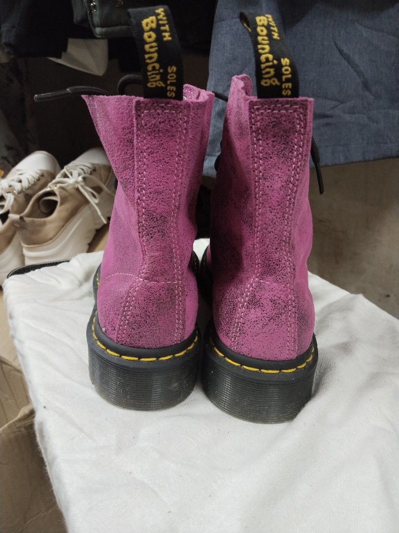 Dr. Martens Pink Glitter 1460 Boots (Category: Boots) located in Pasay City. Submitted by emelsthrift1997 (Listing ID 1460122431, Image 3). Description: - Pink glitter Dr. Martens 1460 boots - Classic lace-up style - Iconic yellow stitching - Made in Laos - Size: UK 4 / US 6 / EU 37 - Perfect for adding an edgy touch to your look - Please check photos for detailed condition.