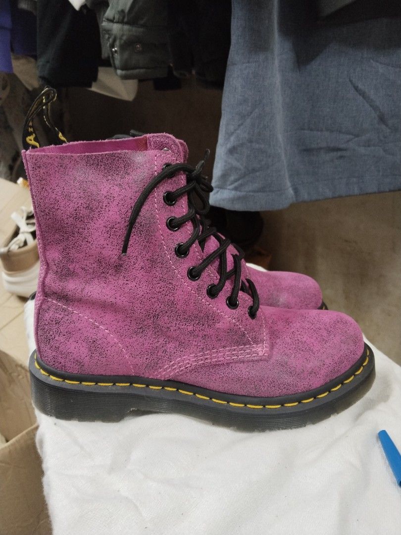 Dr. Martens Pink Glitter 1460 Boots (Category: Boots) located in Pasay City. Submitted by emelsthrift1997 (Listing ID 1460122431, Image 2). Description: - Pink glitter Dr. Martens 1460 boots - Classic lace-up style - Iconic yellow stitching - Made in Laos - Size: UK 4 / US 6 / EU 37 - Perfect for adding an edgy touch to your look - Please check photos for detailed condition.