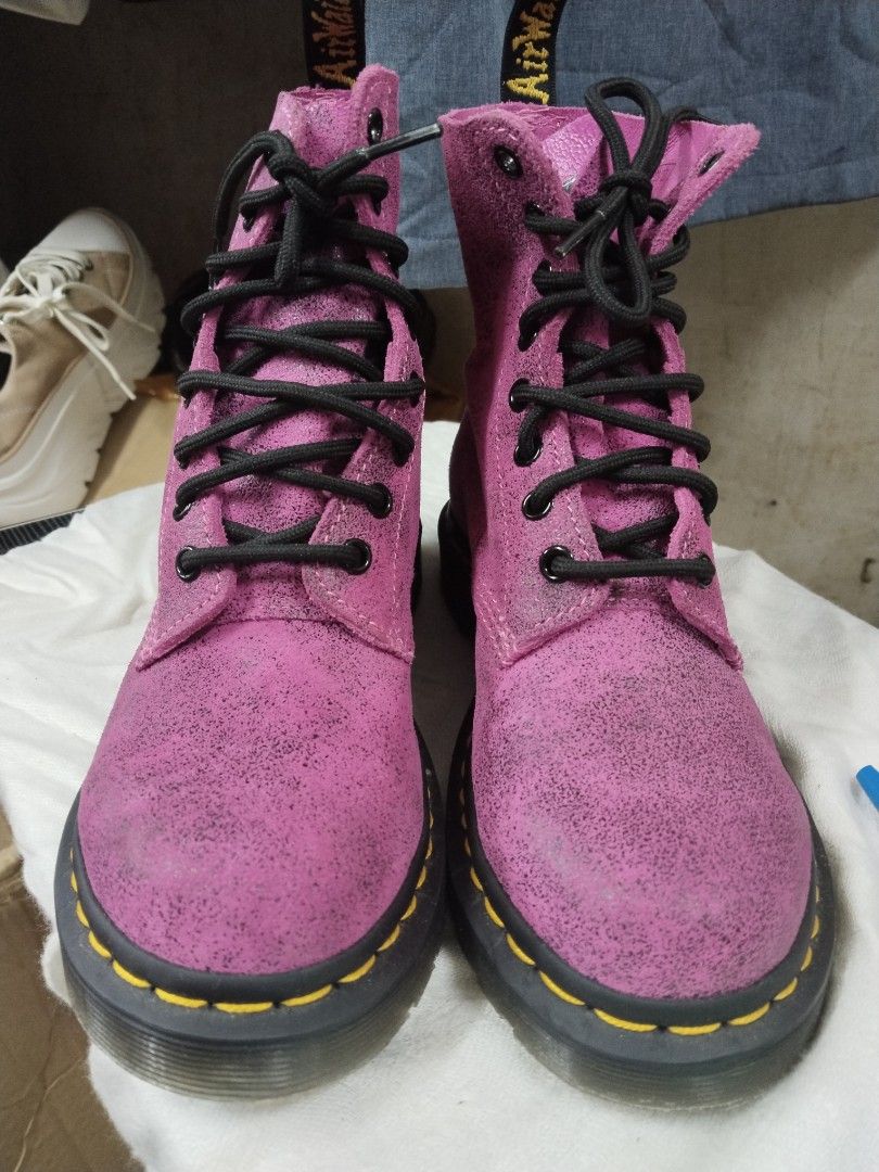 Dr. Martens Pink Glitter 1460 Boots (Category: Boots) located in Pasay City. Submitted by emelsthrift1997 (Listing ID 1460122431, Image 1). Description: - Pink glitter Dr. Martens 1460 boots - Classic lace-up style - Iconic yellow stitching - Made in Laos - Size: UK 4 / US 6 / EU 37 - Perfect for adding an edgy touch to your look - Please check photos for detailed condition.