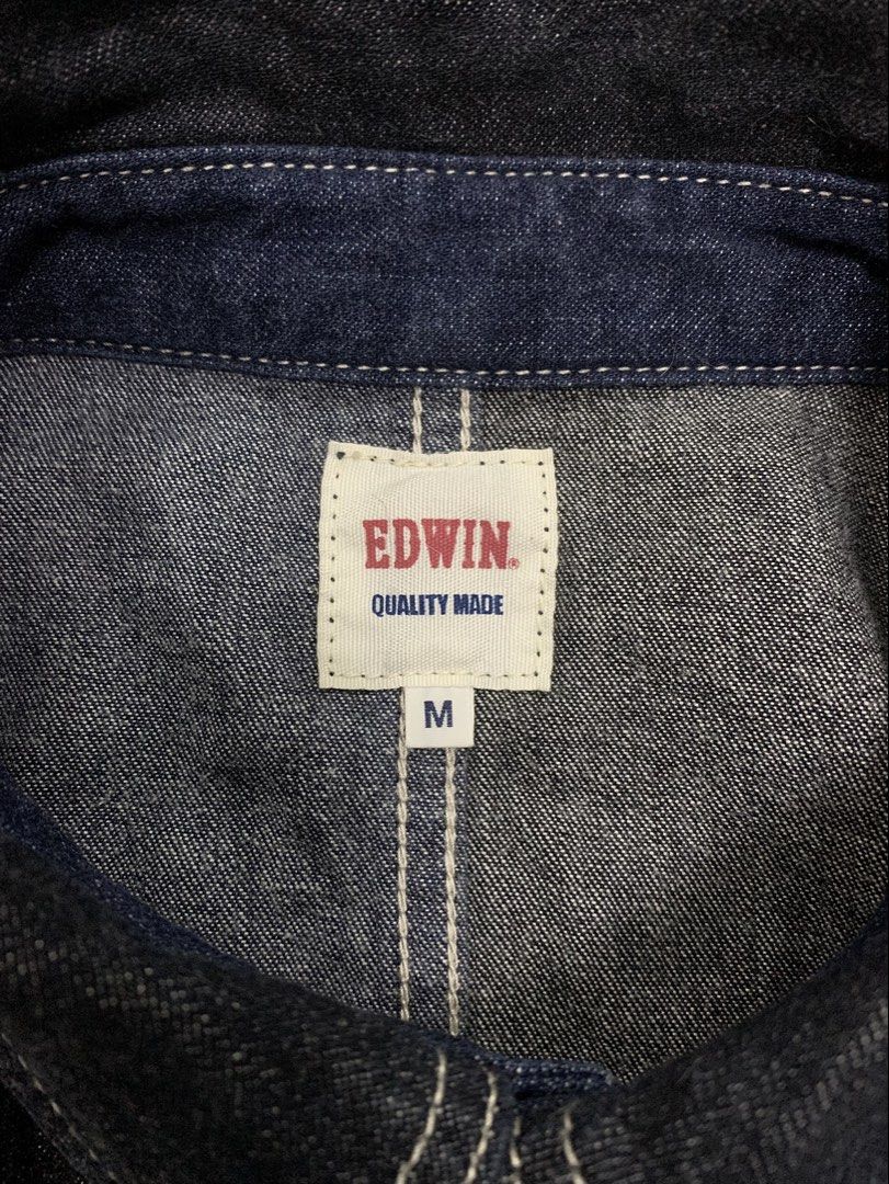 EDWIN JAPAN TWO-TONE DENIM CHORE JACKET (Category: Coats, Jackets and Outerwear) located in Cavite. Submitted by ___layern0ne (Listing ID 1460238788, Image 2). Description: About the product: • Type: Denim Chore Jacket / Work Jacket (characterized by its multi-pocket utility layout and flat-hem casual overshirt styling) • Design Feature: The jacket is unique for using contrasting dark indigo and raw black/deep blue denim panels across the body, s