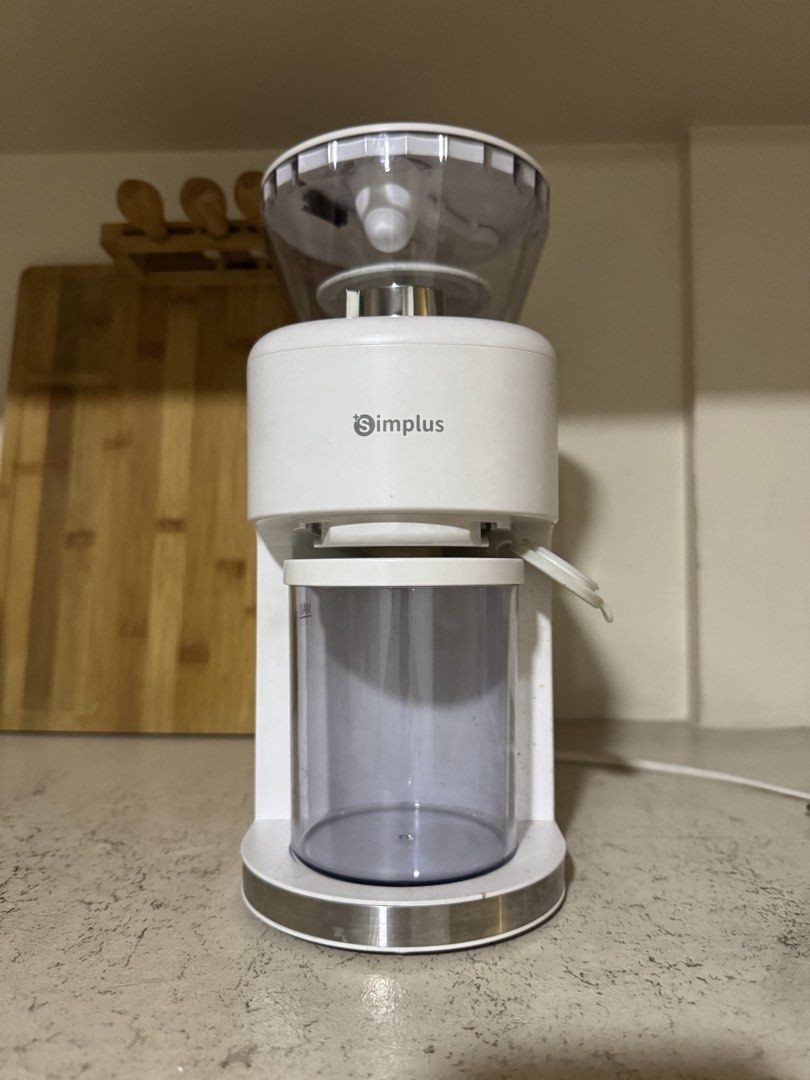 Electric Coffee Grinder Mill (Category: Coffee Machines & Makers) located in Manila. Submitted by rnc.shop (Listing ID 1460250868, Image 2). Description: Simplus Electric Coffee Grinder/ Mill Manila pickup location Grinding mechanism: Burr Adjustable Speed 35 Grinding Settings Customizable Cup Quantity Select from 1 to 12 cups to get exact quantity you need 250g Large-Capacity Bean Hopper.