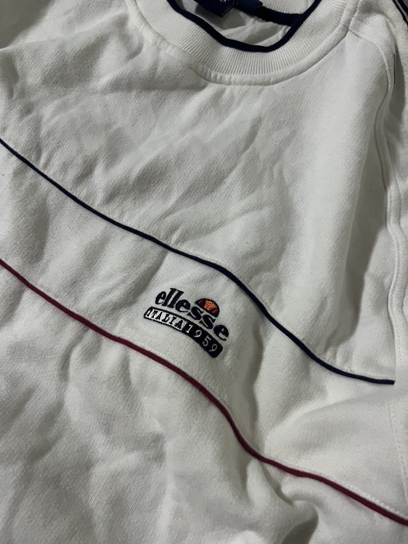 ELLESSE CREWNECK SIDETAPE LOGO (Category: Tshirts & Polo Shirts ) located in Manila. Submitted by yerrr. (Listing ID 1460277350, Image 2). Description: ELLESSE CREWNECK SIDETAPE LOGO PSG OUT🙌🏻 Size: Large on tag Dimes: 25 x 28.5 Excellent Condition Issue: 1 pinhole DM ME📥 NEGOTIABLE ₱1,800.