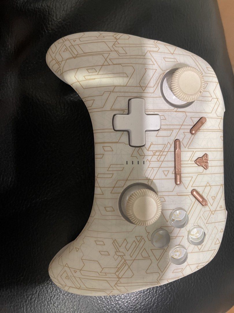 EOS PRO CONTROLLER (Category: Controllers) located in Cyberjaya. Submitted by ashyyy98 (Listing ID 1460276529, Image 3). Description: - Limited Edition: White and Gold colorway - Custom light-up buttons for a unique look - Unique patterned shell design - Excellent working condition .