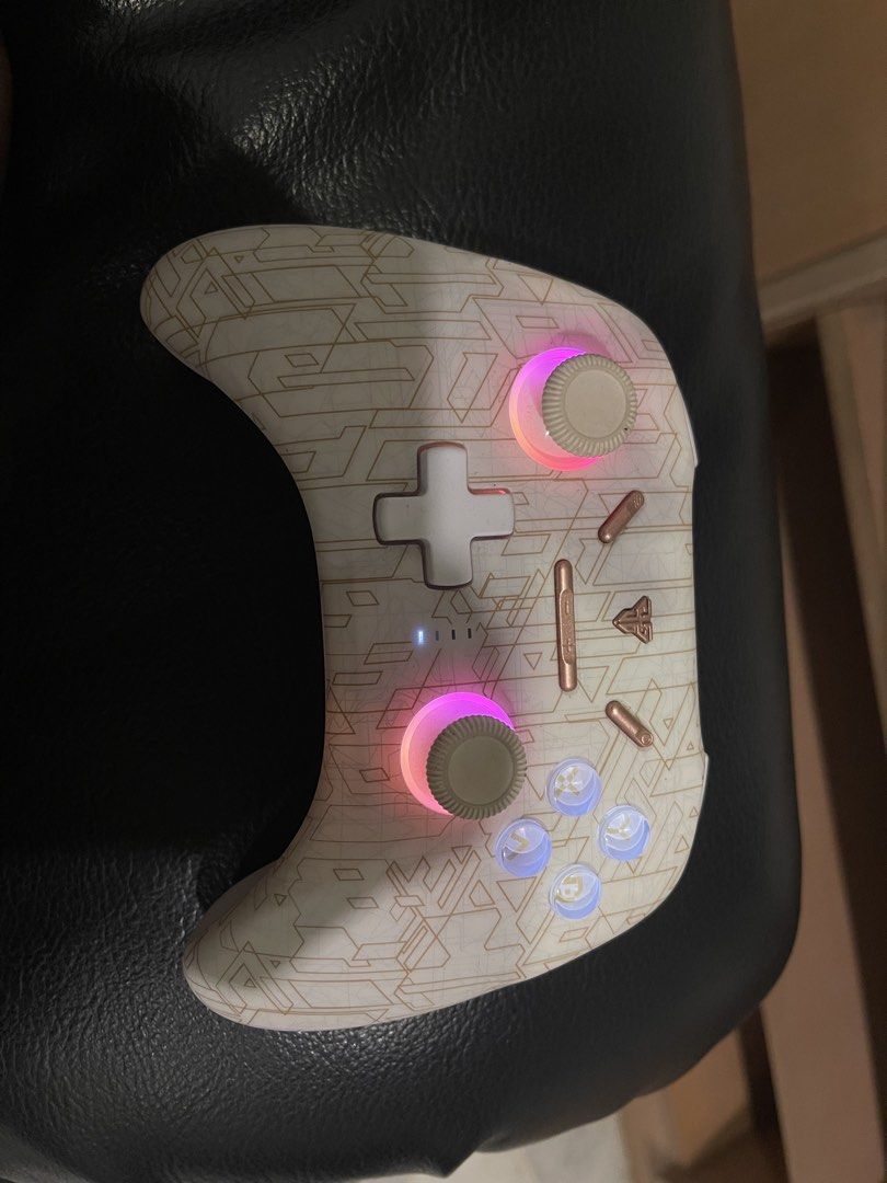 EOS PRO CONTROLLER (Category: Controllers) located in Cyberjaya. Submitted by ashyyy98 (Listing ID 1460276529, Image 1). Description: - Limited Edition: White and Gold colorway - Custom light-up buttons for a unique look - Unique patterned shell design - Excellent working condition .