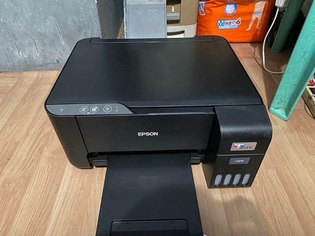 EPSON L3210 - 3in1 Printer (Category: Printers, Scanners & Copiers) located in Manila. Submitted by sheen_marcellano (Listing ID 1460248405, Image 2). Description: EPSON L3210 - 3in1 Printer ✅ Print (Short, A4, Long) ✅ Photocopy (Short & A4) ✅ Scan (Short & A4) ✅ Borderless Printing ✅ Dye Ink ✅ Continuous Ink ✅ Ecotank ✅ Complete Nozzle 📍Quezon City Test all you want! ✅ Pick up and/or lalamove..