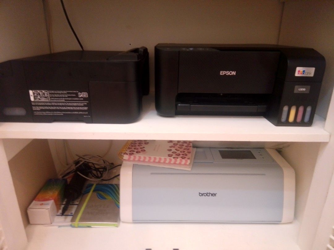 Epson L3210 Printer and Brother Scanner (Category: Printers, Scanners & Copiers) located in Paranaque City. Submitted by fiercemoon_02d8b2 (Listing ID 1460189535, Image 1). Description: for 3of them the price - Epson L3210 Printer with ink tanks - Compact Brother Scanner - Perfect for digitizing documents - Includes all necessary cables - Ready for a new home!.