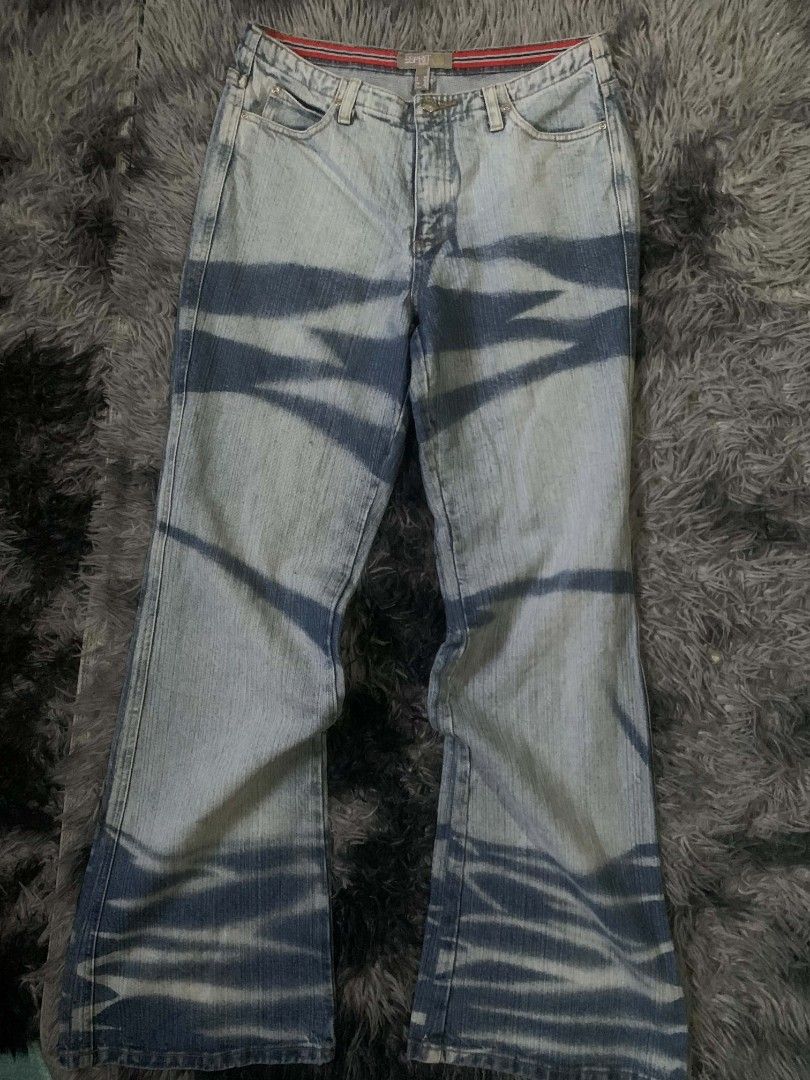 Esprit Jeans - Light Wash Flare Jeans with Unique Pattern (Category: Jeans) located in Tarlac. Submitted by rhandell_collectives (Listing ID 1460267923, Image 1). Description: - Brand: Esprit - Style: Flare leg jeans - Wash: Light wash denim - Design: Unique tie-dye or bleached pattern - Vibe: Statement piece, edgy, unique - Perfect for: Adding an edge to any outfit.