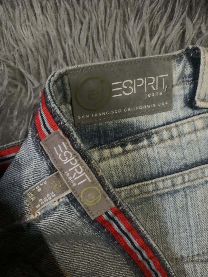 Esprit Jeans - Light Wash Flare Jeans with Unique Pattern (Category: Jeans) located in Tarlac. Submitted by rhandell_collectives (Listing ID 1460267923, Image 3). Description: - Brand: Esprit - Style: Flare leg jeans - Wash: Light wash denim - Design: Unique tie-dye or bleached pattern - Vibe: Statement piece, edgy, unique - Perfect for: Adding an edge to any outfit.