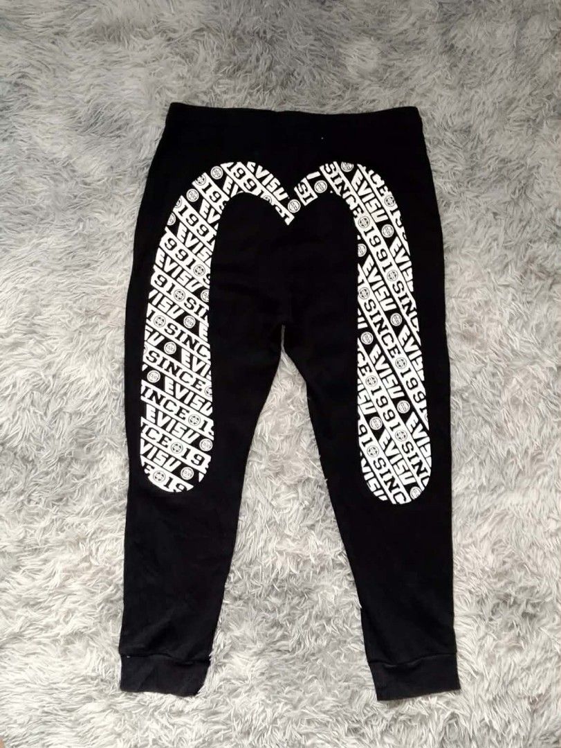Evisu daicock sweatpants (Category: Joggers) located in Panabo. Submitted by sinneddasalla (Listing ID 1460122493, Image 1). Description: Evisu daicock sweatpants "since 1991" waist 34 with lace Length 37 thigh 10 hem 5 Excellent condition 10/10 color rate no crack prints.