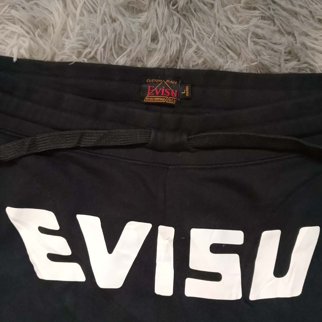 Evisu daicock sweatpants (Category: Joggers) located in Panabo. Submitted by sinneddasalla (Listing ID 1460122493, Image 3). Description: Evisu daicock sweatpants "since 1991" waist 34 with lace Length 37 thigh 10 hem 5 Excellent condition 10/10 color rate no crack prints.