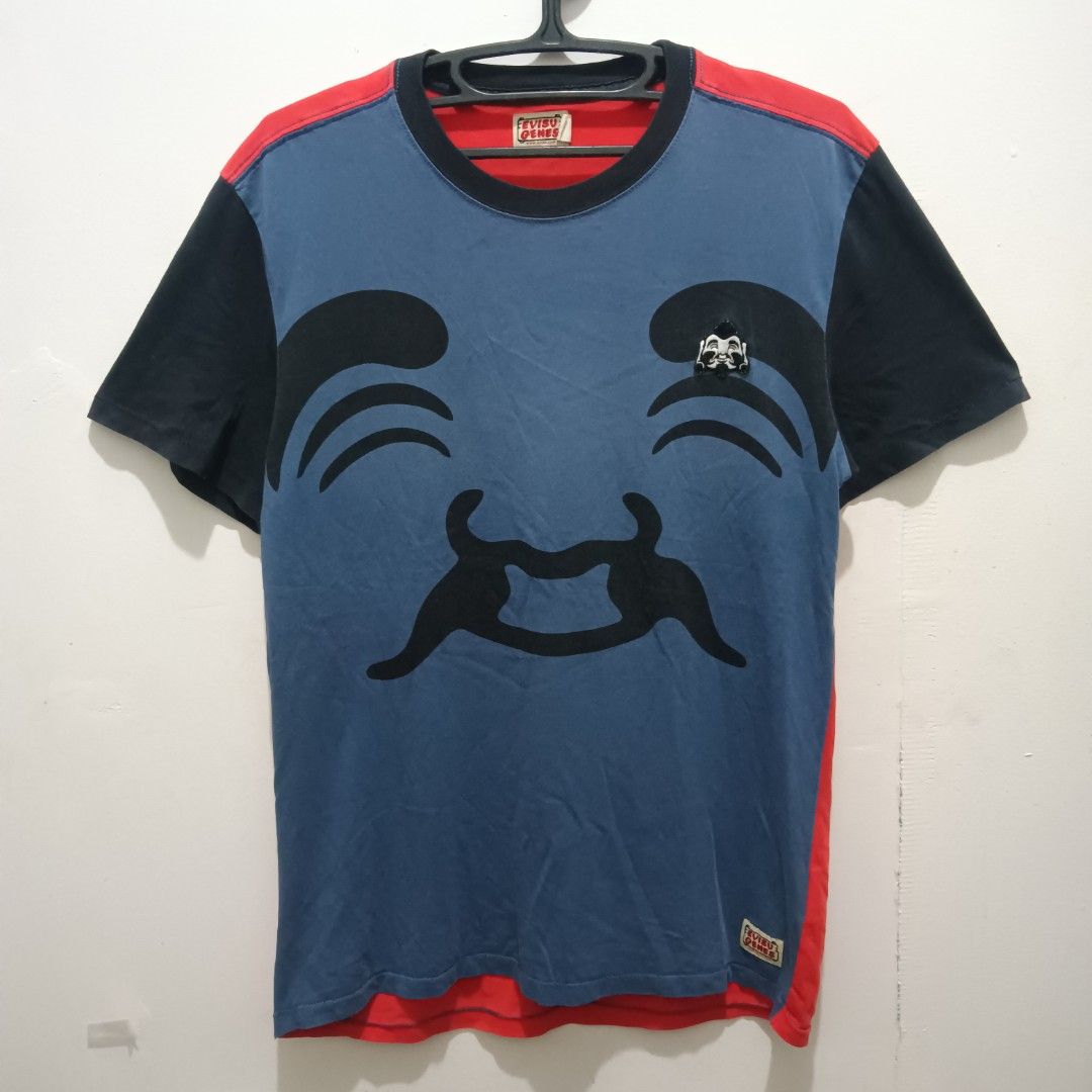 EVISU GENES Shirt (Blue/Orange) (Category: Tshirts & Polo Shirts ) located in Quezon City. Submitted by jaychingsss (Listing ID 1460204729, Image 1). Description: Evisu Genes Shirt - 100 18x27 Complete Tags Color Rate: 9/10 NEED WASH.