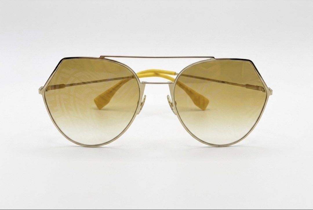 Fendi FF 0194/S (Category: Luxury Accessories) located in City of Isabela. Submitted by ibzagga (Listing ID 1460283896, Image 1). Description: ✨ AUTHENTIC FENDI EYELINE GEOMETRIC SUNGLASSES ✨Level up your eyewear game with this iconic, head-turning piece from Fendi! Features a sleek, light gold geometric metal frame and the unmistakable FF monogram mirror lenses that catch the light perfectly. 🕶️🔥Model: Fendi FF 0194/S (Color Code: DYGEB)Size: 