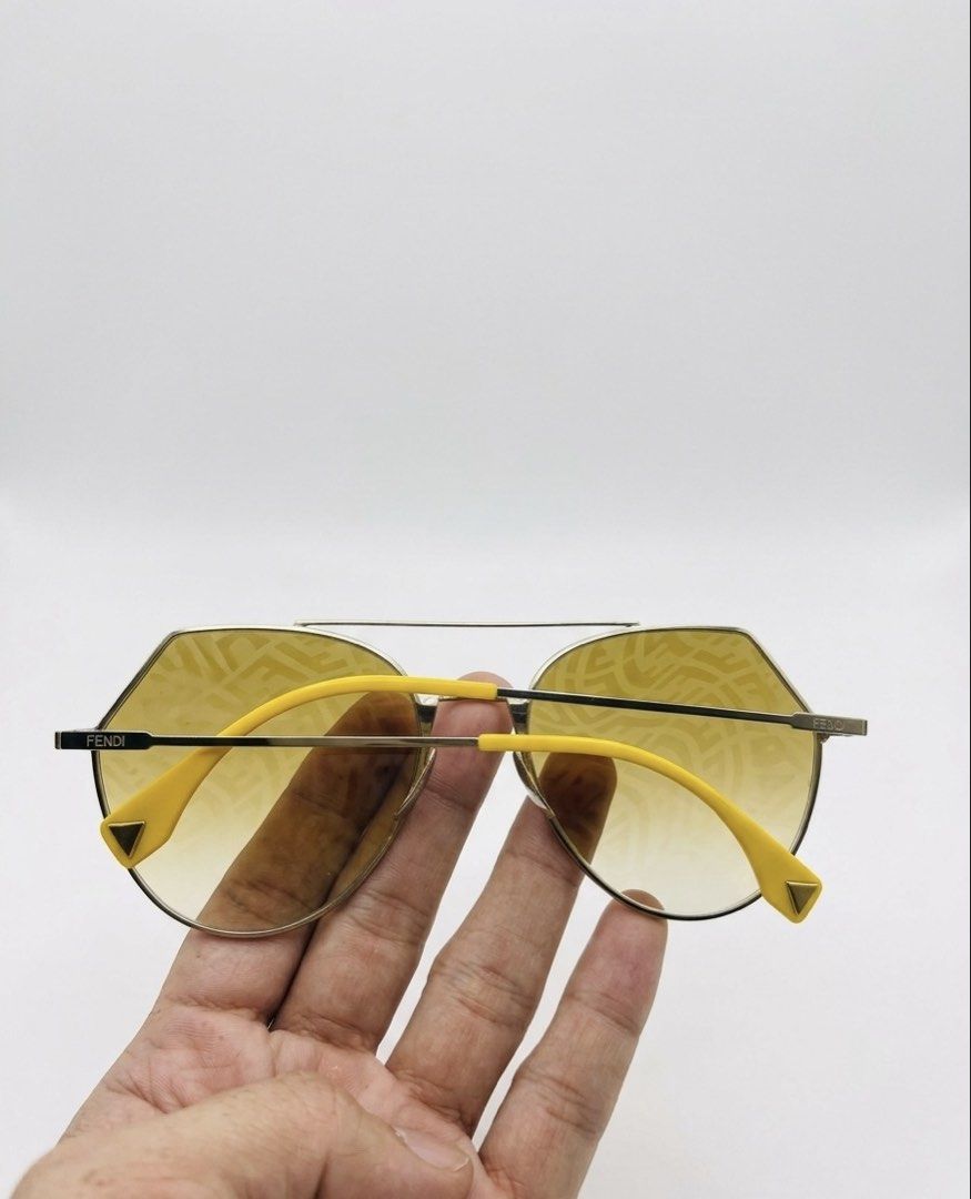 Fendi FF 0194/S (Category: Luxury Accessories) located in City of Isabela. Submitted by ibzagga (Listing ID 1460283896, Image 2). Description: ✨ AUTHENTIC FENDI EYELINE GEOMETRIC SUNGLASSES ✨Level up your eyewear game with this iconic, head-turning piece from Fendi! Features a sleek, light gold geometric metal frame and the unmistakable FF monogram mirror lenses that catch the light perfectly. 🕶️🔥Model: Fendi FF 0194/S (Color Code: DYGEB)Size: 