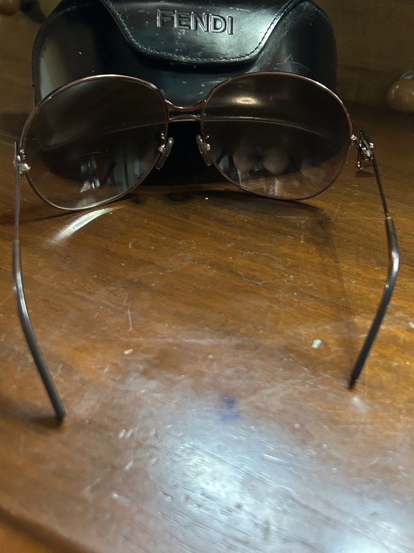 Fendi Round Rose Gold Sunglasses (Category: Sunglasses & Eyewear) located in Caloocan City. Submitted by guitara1822 (Listing ID 1460147274, Image 3). Description: - Round sunglasses with a chic rose gold frame. - Features tinted lenses for a stylish look. - Subtle sheen on the frame adds a touch of elegance. - An essential accessory for sunny days and daily outfits..