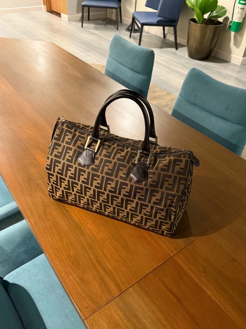 FENDI ZUCCA BOSTON BAG (Category: Luxury Bags & Wallets) located in Manila. Submitted by azgtrrz (Listing ID 1460250657, Image 1). Description: FOR SALE FENDI ZUCCA BOSTON BAG USED PRESTINE 28,000 php MANILA AREA.