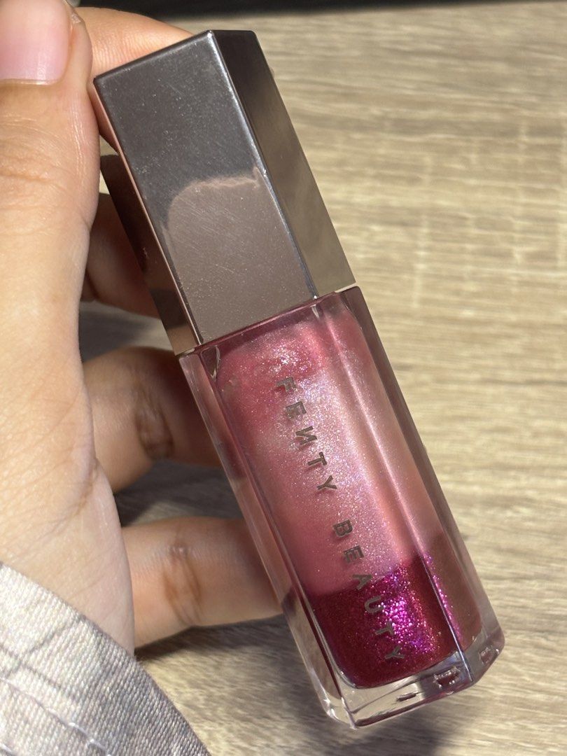 Fenty Beauty Lip Gloss (Category: Makeup) located in Davao. Submitted by mielle_888 (Listing ID 1460169876, Image 2). Description: Fenty Beauty Lip Gloss Shade: Sugar Plumz No box Bought around June .